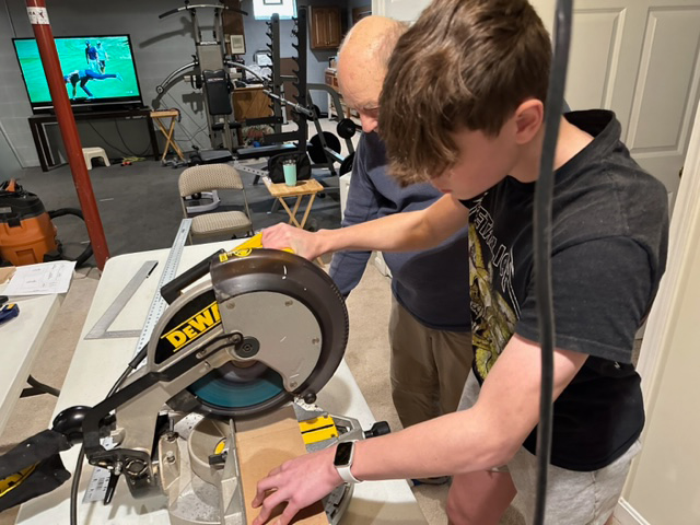 Cutting with a miter saw